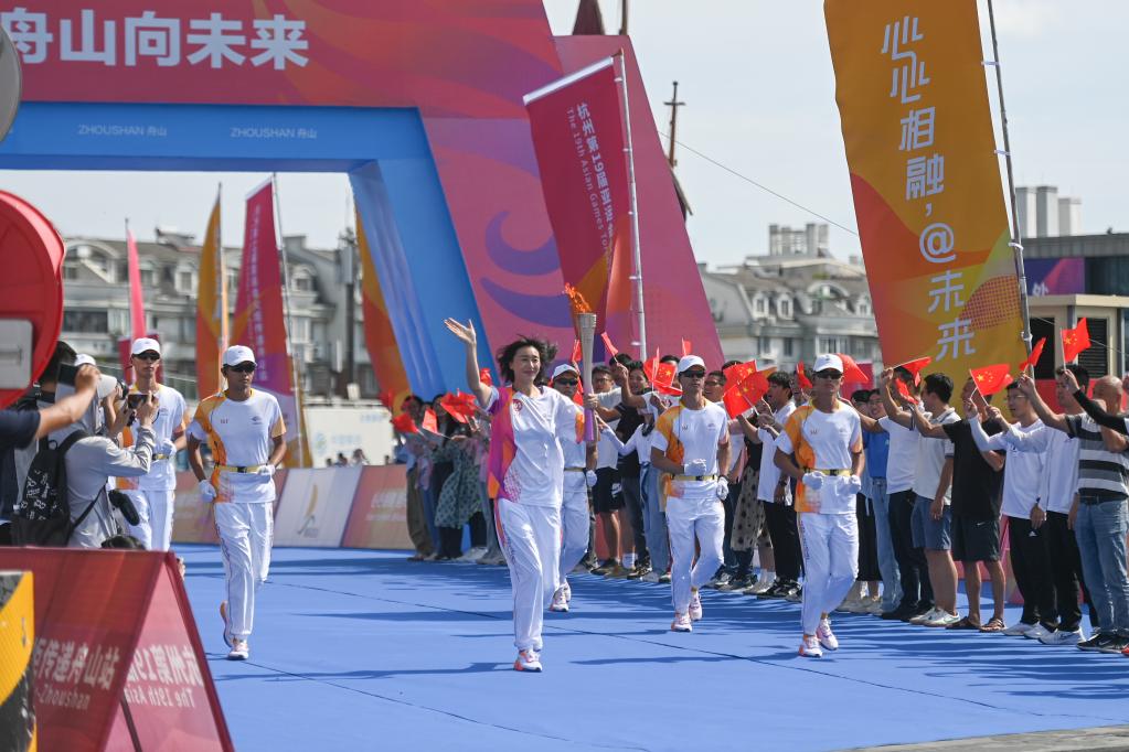 杭州亚运会｜“薪火”凝聚榜样力量――亚运火炬手速写